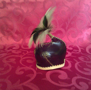 Kirgui marrón con plumas - 30€